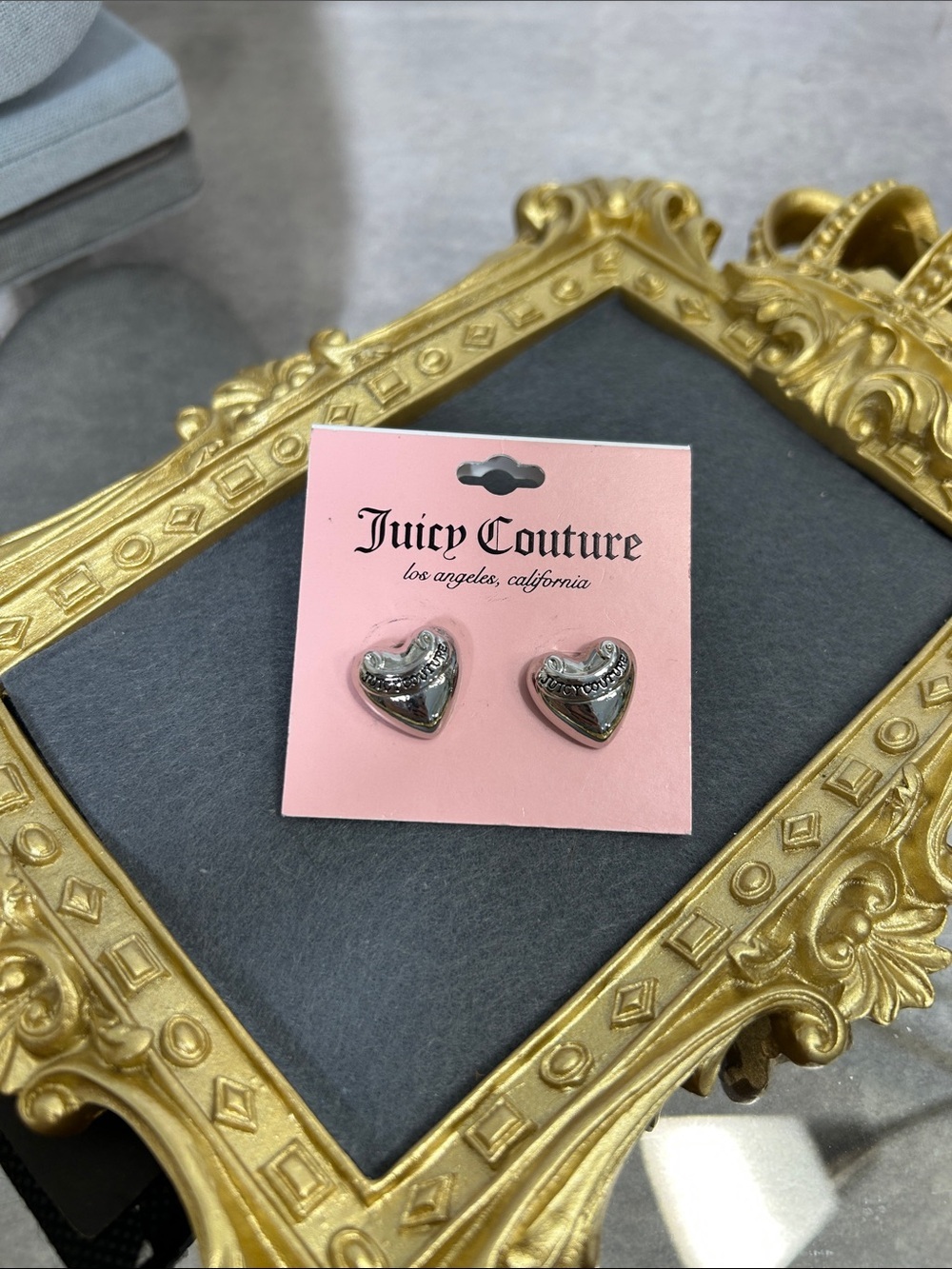 Juicy Couture Silver Heart Stud Earrings on Pink Card